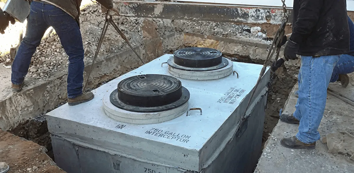 Grease trap installation for a commercial property drainage system in Overland Park, KS