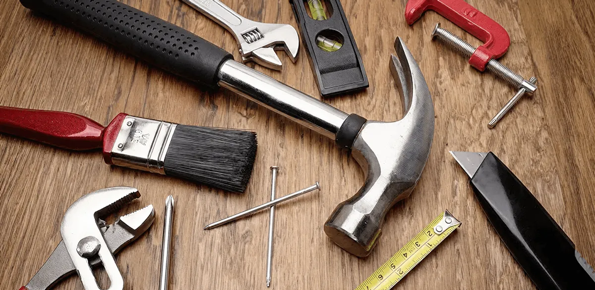 Handyman tools laid out for home repair and maintenance work in Overland Park, KS