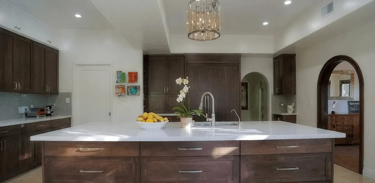Cabinet refacing project with updated kitchen cabinets and island in Overland Park, KS